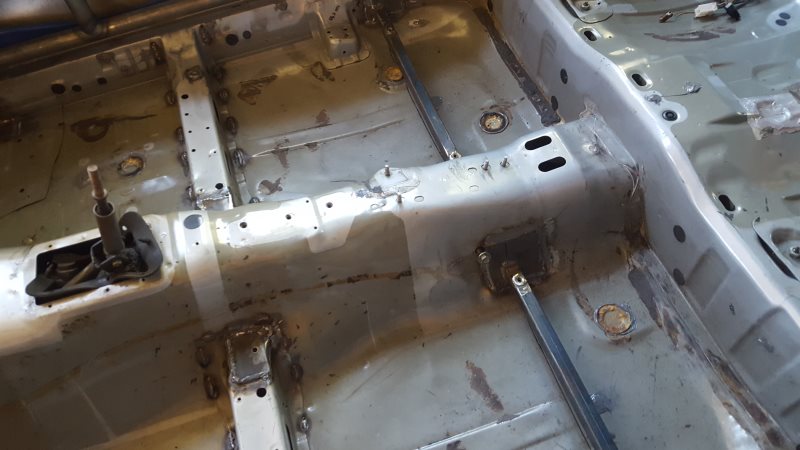 Seam welding complete and seat mounting bars fitted.
